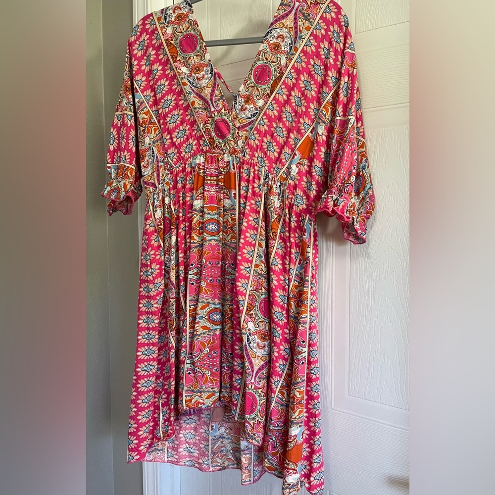 Women’s  dress size large bought from Jane boutique. Pink and blue floral